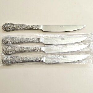 Reed Barton Flora Steak Knives 9.5" set/4 stainless embossed flowers chintz
